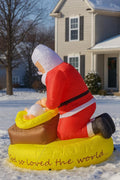 Santa Kneels Before the Savior TM Christmas Inflatable Santa Prays for Baby Christ Child. Lighted Outdoor